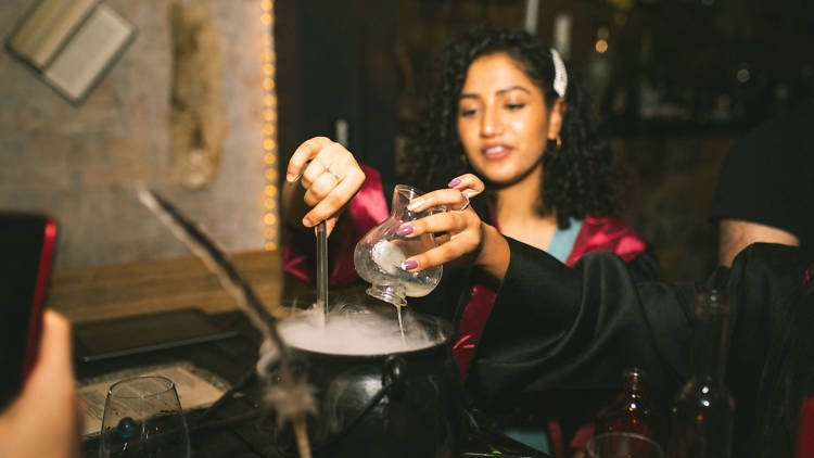 Lady making a potion