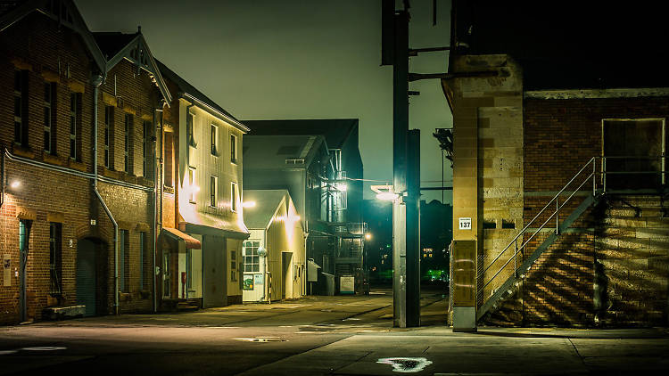 A dark street at the very haunted Cockatoo Island