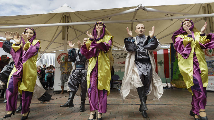 People dancing in traditional dress at the Lebanese Carnival at Darling Harbour.