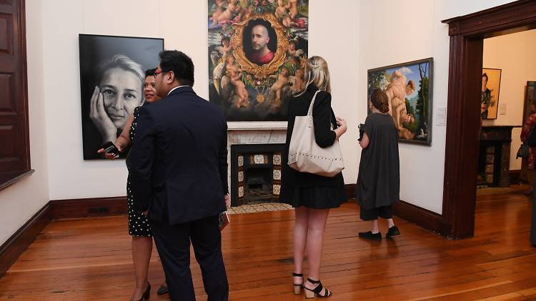 People viewing the Doug Moran National Portrait Prize