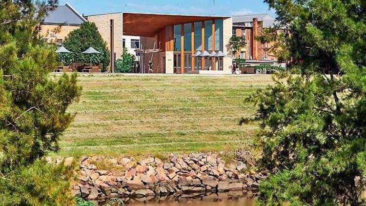 Grab a coffee and browse a riverside shopping precinct 