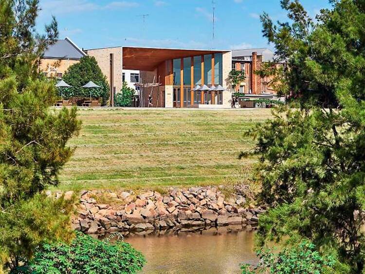 Grab a coffee and browse a riverside shopping precinct 