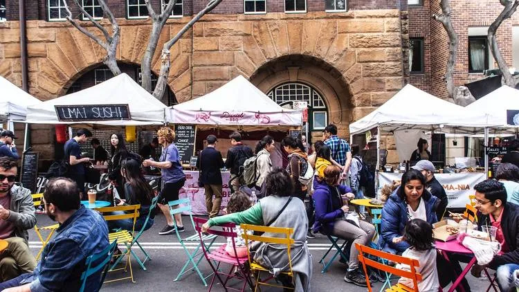 People sitting and eating at the Rocks Markets