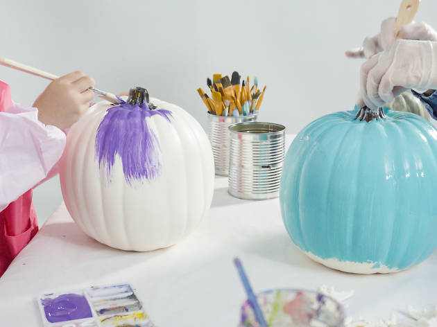 Free Halloween Workshop Broadway Kids painting pumpkins multicoloured.
