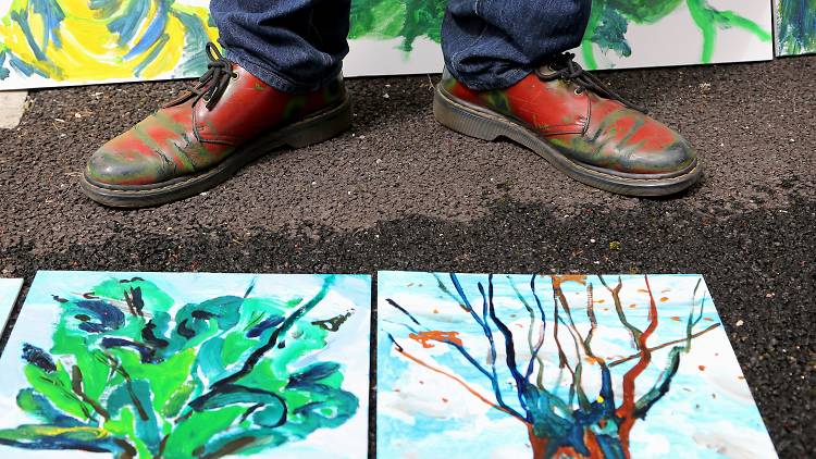 Artist Bob and Roberta Smith pictured during workshops for people to paint pictures of the 300-year-old sycamore tree at Tolpuddle that symbolises the start of the trade union movement in Britain as part of the National Trust's People’s Landscapes: Explor