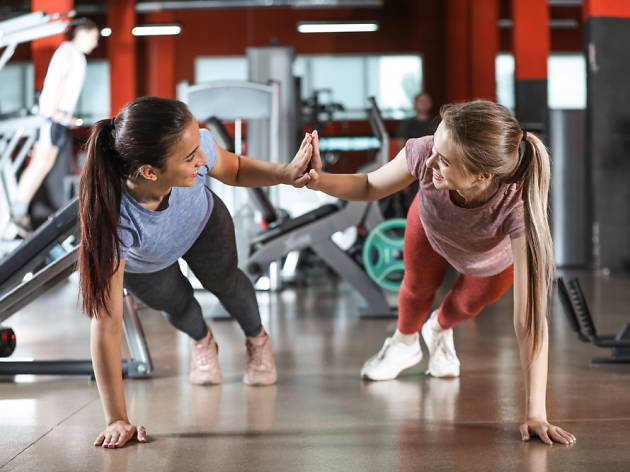 Friends working out together Friends working out together