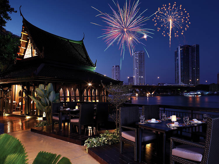 Have dinner under the full moon at a riverside hotel