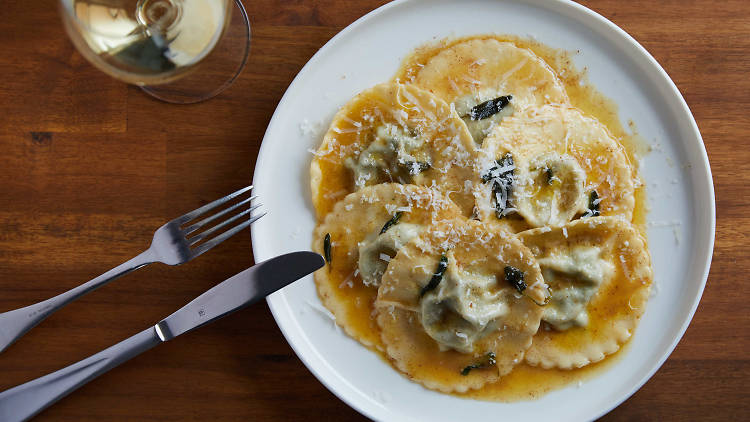 A plate of tortelli with butter and sage