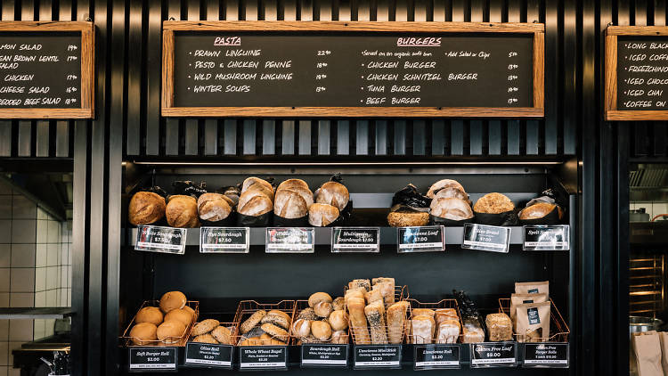 Loaves of bread on the shelves at Bake Bar