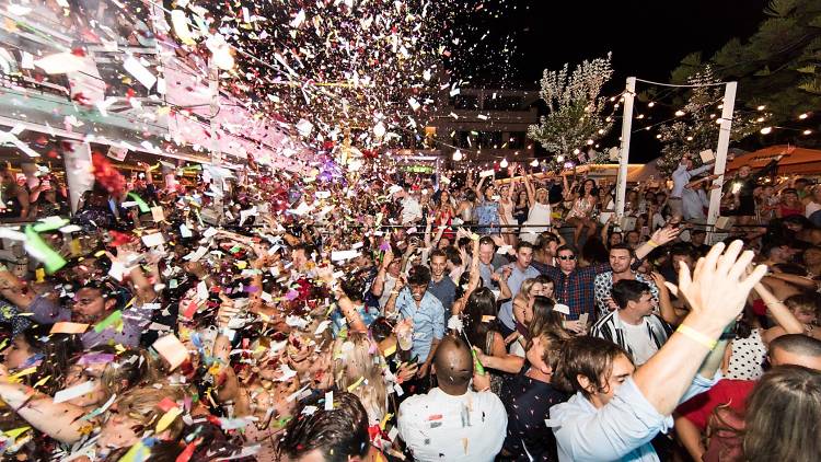 People dancing under confetti at Watsons Bay Boutique Hotel,