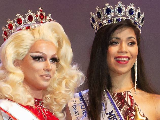 Miss Gay and Miss Trans Australia A drag queen and a beauty queen pose with crowns.