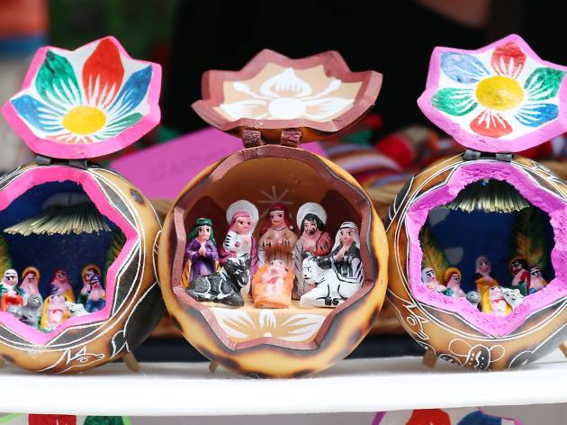 Fair Trade Christmas Market Three dioramas made from coconuts depicting nativity scenes.