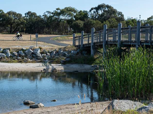 Karkarook Park Cyclist and lake at Karkarook Park