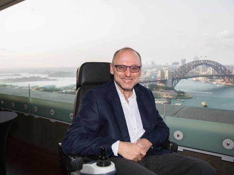 Accessibility advocate Max Burt overlooking Sydney Harbour.