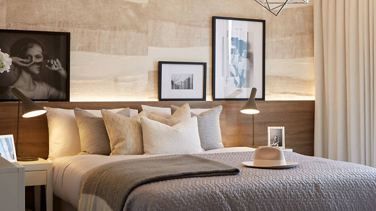 bedroom interior with bed and cushions