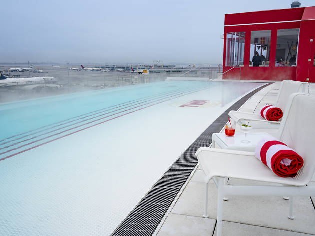 This massive rooftop hot tub will be overlooking the runway at JFK all winter This massive rooftop hot tub will be overlooking the runway at JFK all winter
