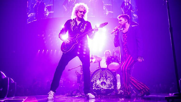 Adam Lambert on stage with Queen