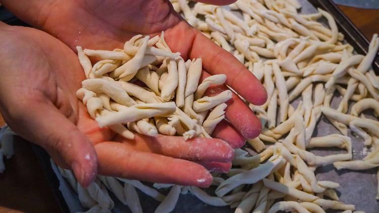 Handmade pasta in someone's hands