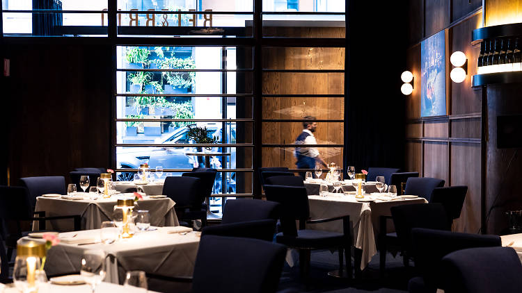 Tables in a dimly lit dining room