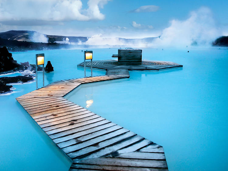 Take a dip in a volcanic lagoon in Iceland