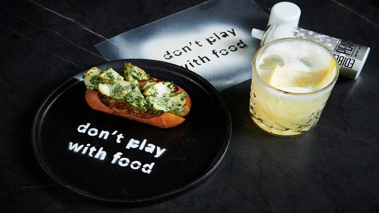 Plate graffitied with "don't play with food"