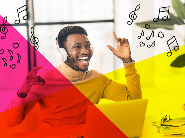 Man listening to music with his laptop