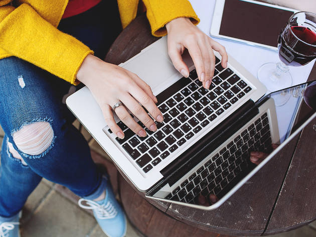 6 ways to absolutely crush your next virtual happy hour laptop, wine, woman, computer, drinking, shutterstock, Katsiaryna Pakhomava