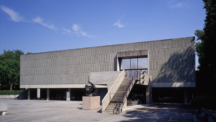 The forecourt studded with Rodin sculptures