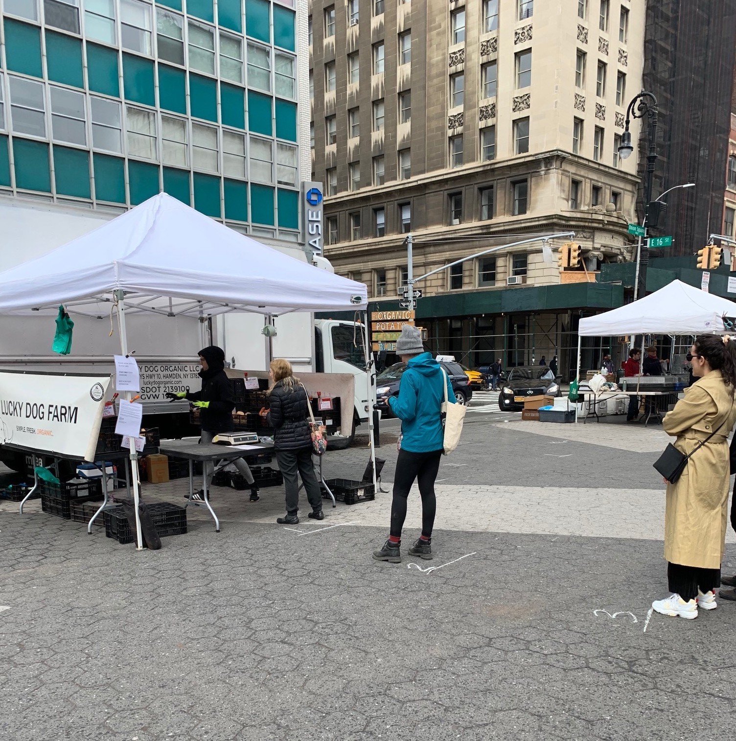 line of people waiting at Farmers Market
