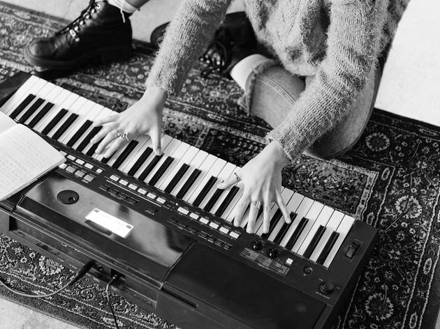 Pensive Teenager Choosing Composition For Playing Synthesizer At Pensive Teenager Choosing Composition For Playing Synthesizer At Estrella Damm #UnaEstrellaACasa