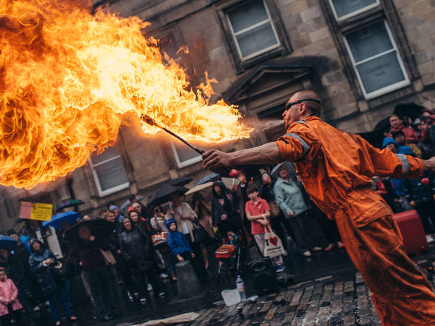 A fire-eating performer at Edinburgh Festival Fringe A fire-eating performer at Edinburgh Festival Fringe