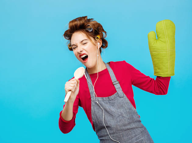 Cute girl sings songs in spoon listening to music Cute girl sings songs in spoon listening to music