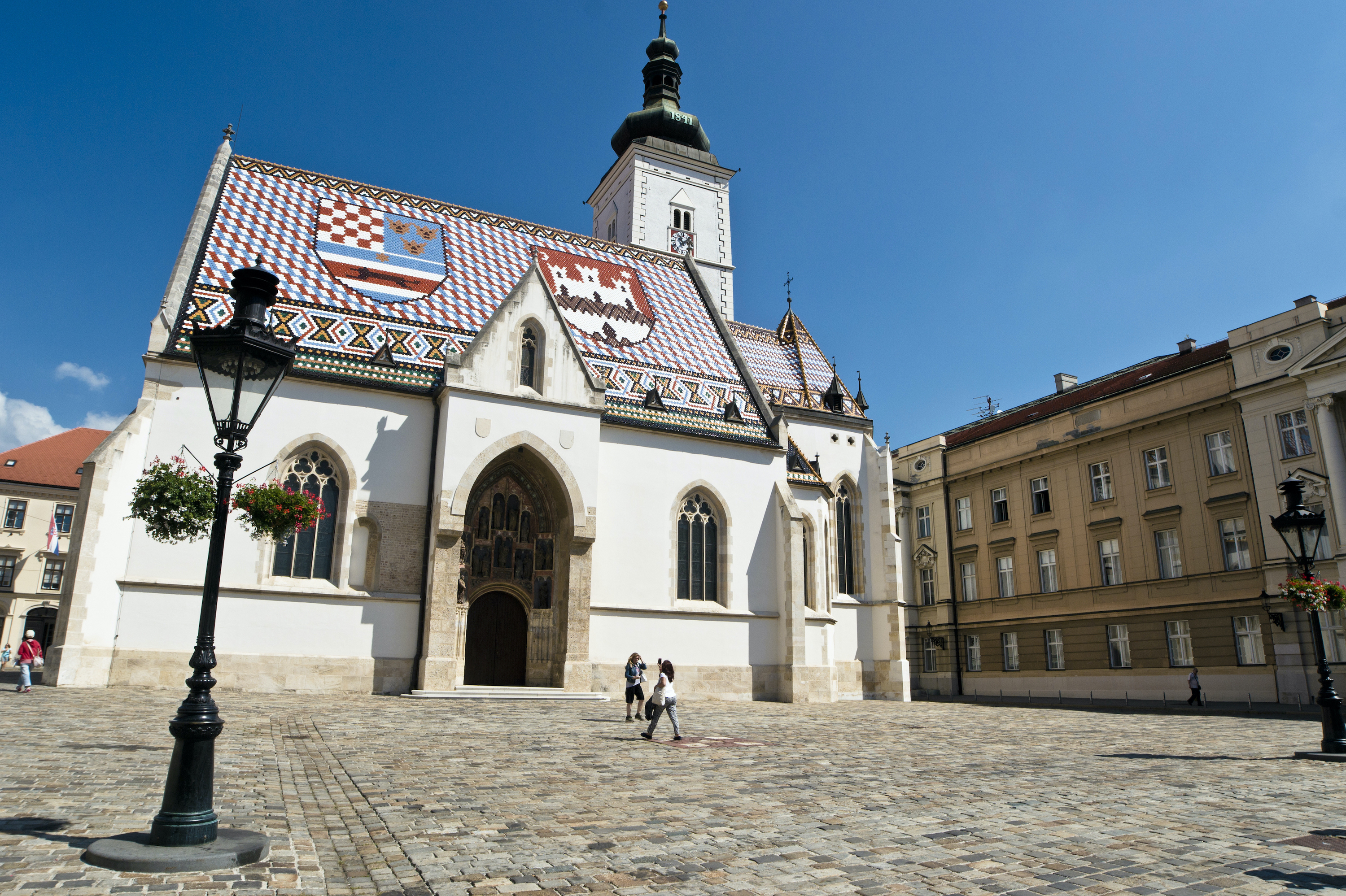 Saint Mark's square in Zagreb is home to the namesake church, which dates back to the 13th century, and surrounding Croatian Parliament buildings