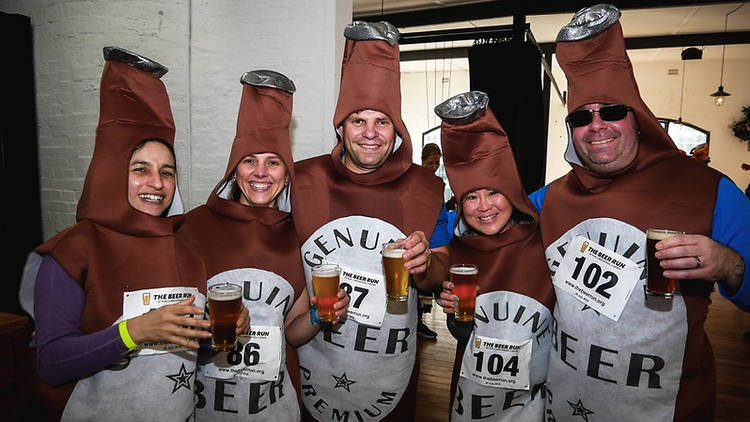 People dressed up in beer costumes