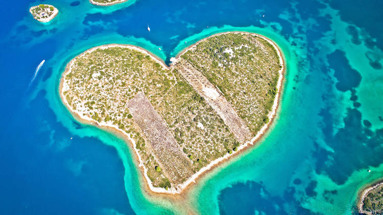 Heart shaped island of Galesnjak in Zadar archipelago aerial vie