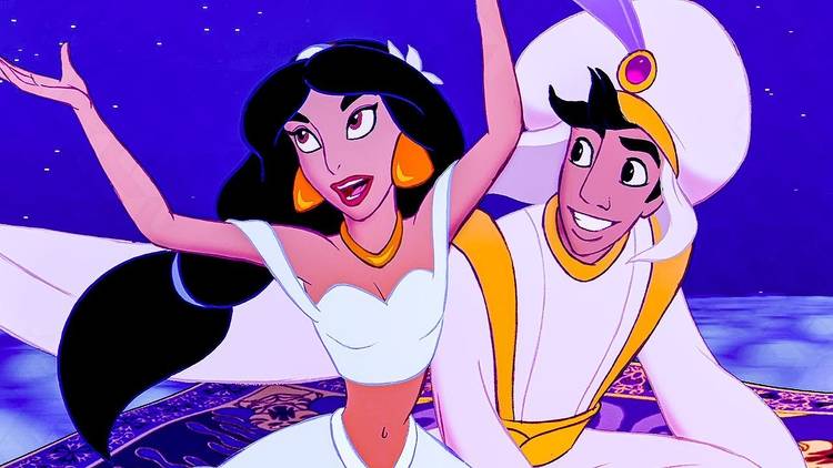 Film still from Disney's Aladdin, Jasmine and Aladdin ride on a magic carpet.