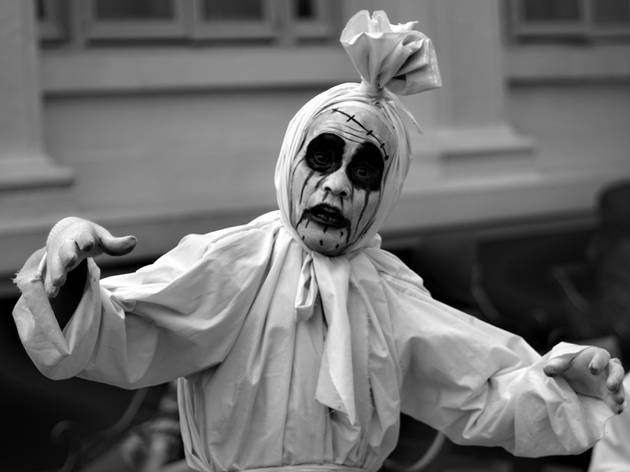 A person dressed as a pocong ghost in Bandung, Indonesia A person dressed as a pocong ghost in Bandung, Indonesia