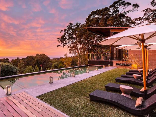 Spicers Sangoma Resort Chairs overlooking pool at sunset