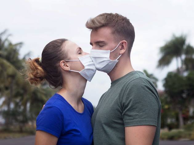 Couple with face masks Couple with face masks