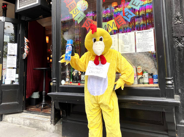 This NYC bar has a chicken social-distancing mascot chicken costume