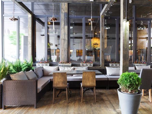 The future of restaurant dining is reservation-only restaurant, restaurant interior, interior, tables, shutterstock