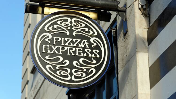 pizza express sign at the front of one of its UK branches
