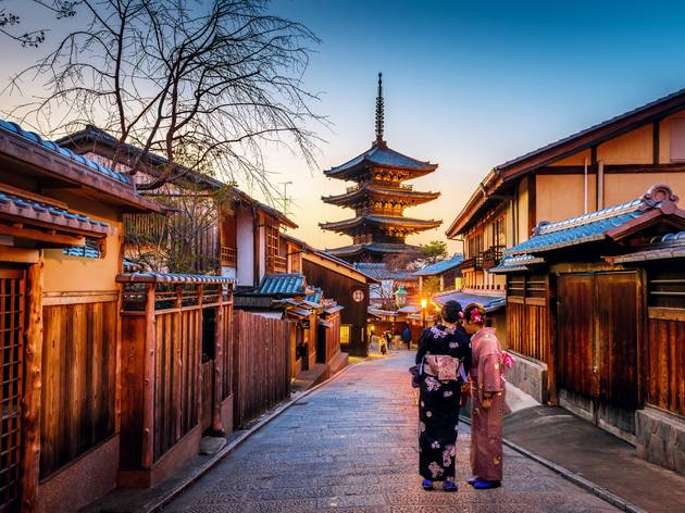 Two women in Kyoto Two women standing in street