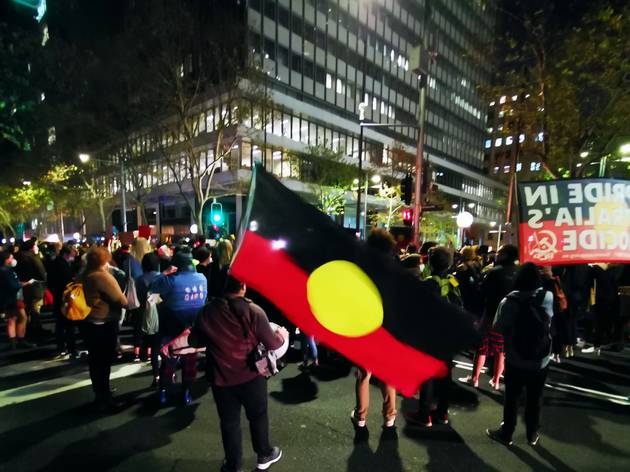 Aboriginal flag at BLM protest Sydney Aboriginal flag and protestors