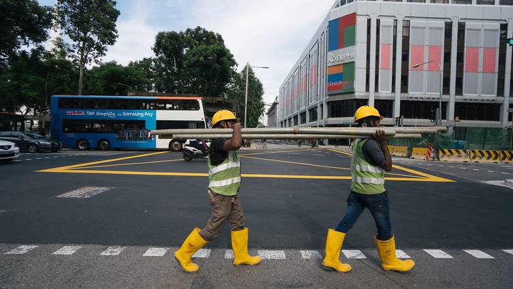 Foreign workers building Singapore