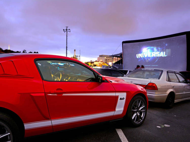 See a flick at a drive-in theater