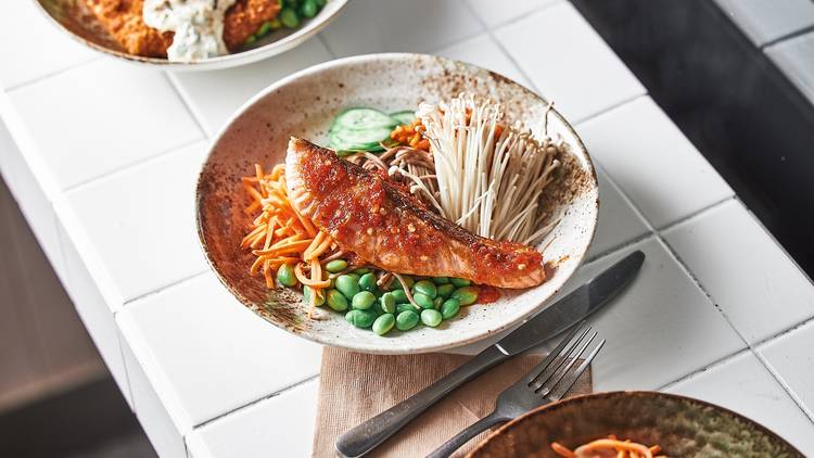 Fish, edamame and carrot in a bowl