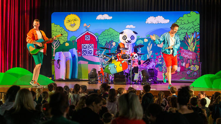 The Mik Maks performing on stage at Geelong Arts Centre to an adoring crowd of children