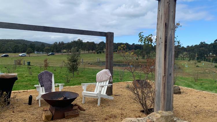 Chairs in field