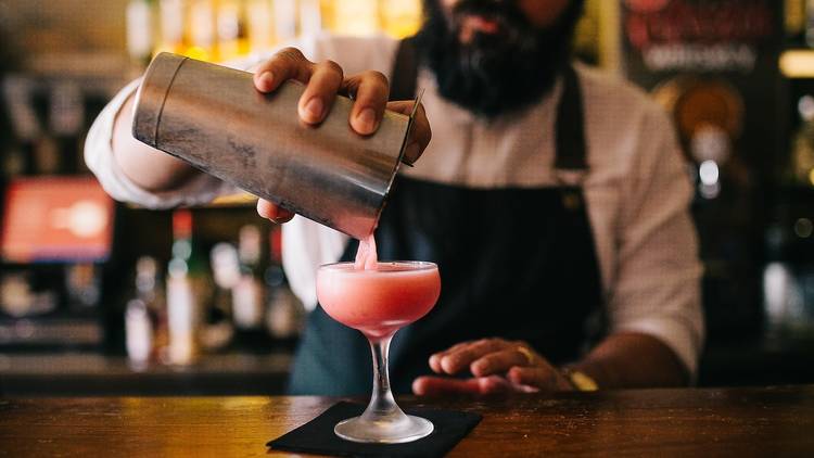 Take an elbow at a cool cocktail bar